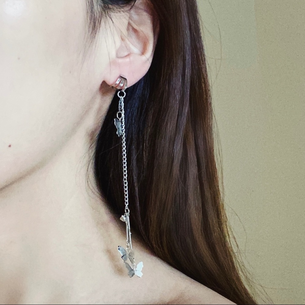 Earclip earrinr with butterfly detailing